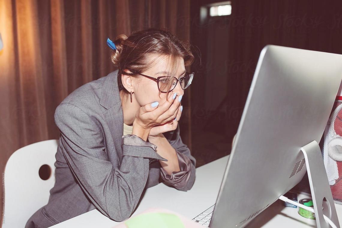 Engineer working through architecture decisions at a technical workspace
